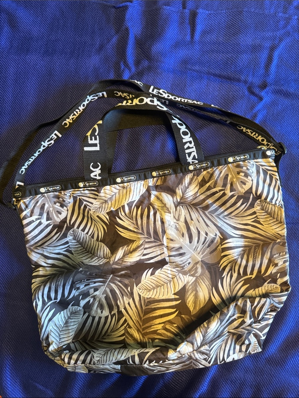 LeSportsac Monstera leaf print black & grey tote bag.